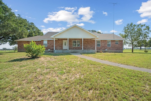 ranch-style house with a front yard