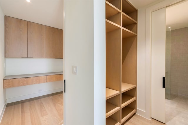 mudroom with light wood-type flooring