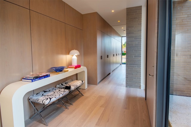 corridor featuring light hardwood / wood-style floors