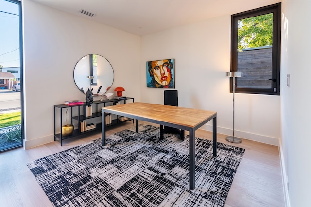 office with hardwood / wood-style flooring