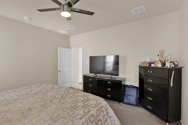 bedroom featuring light colored carpet, ceiling fan, and indoor bar