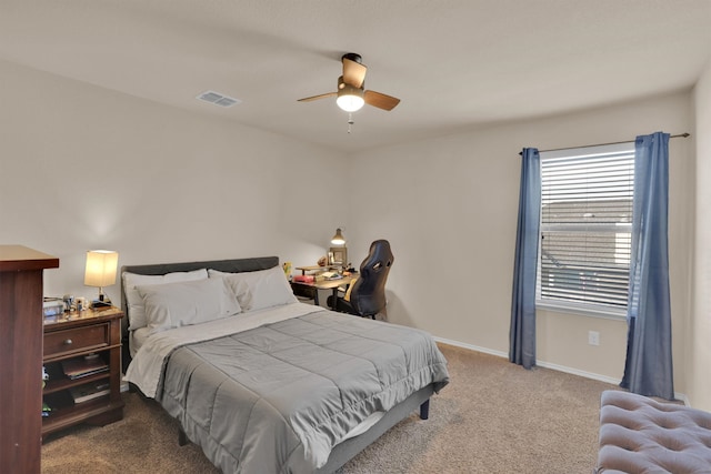 carpeted bedroom with ceiling fan