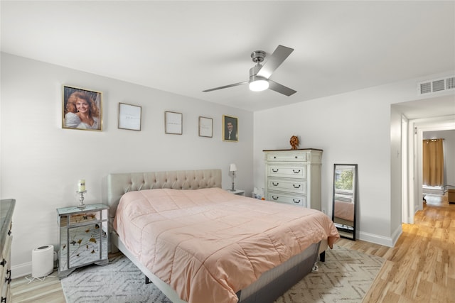 bedroom featuring ceiling fan and light wood-type flooring