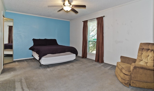 bedroom with ornamental molding, a textured ceiling, carpet floors, and ceiling fan