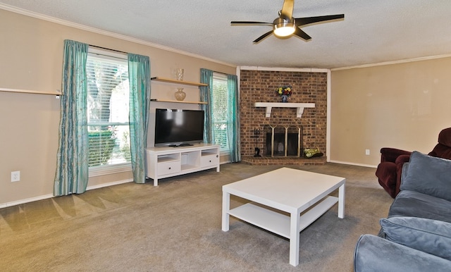 carpeted living room with ornamental molding, a brick fireplace, a textured ceiling, and ceiling fan