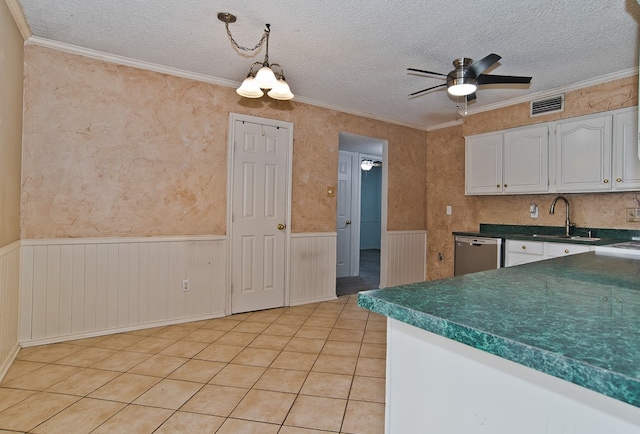 kitchen featuring hanging light fixtures, white cabinetry, dishwasher, ceiling fan with notable chandelier, and sink