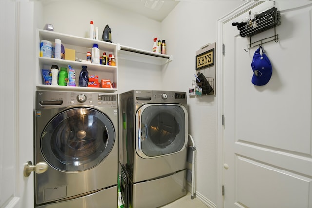 laundry area with separate washer and dryer