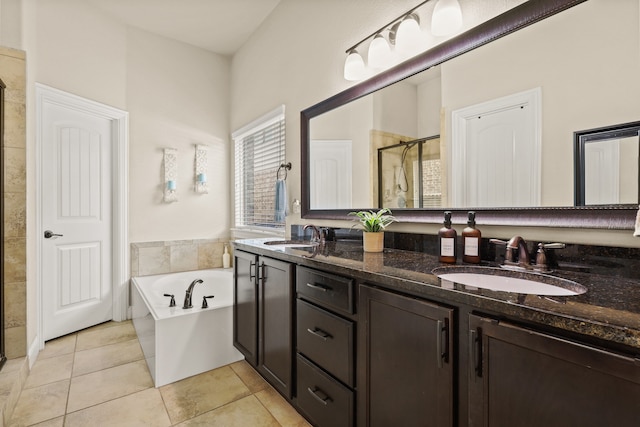 bathroom with vanity, shower with separate bathtub, and tile patterned floors