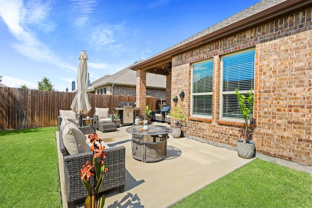 view of patio with a fire pit