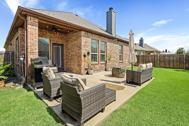 back of property featuring an outdoor hangout area, a yard, and a patio