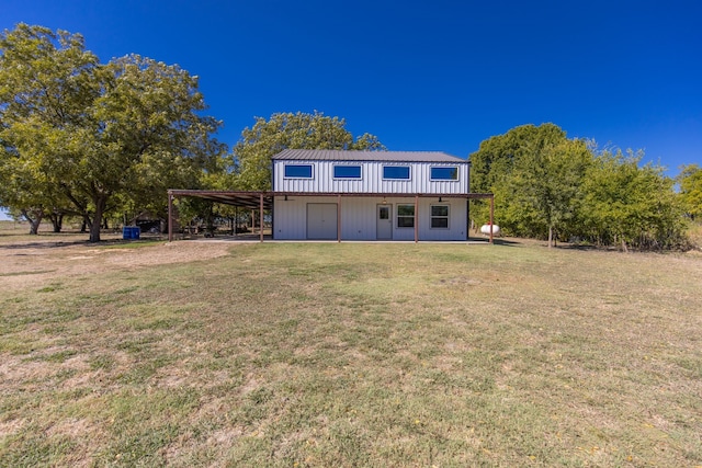 exterior space featuring a lawn and a carport