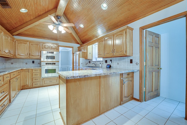 kitchen with backsplash, kitchen peninsula, stainless steel double oven, and wood ceiling