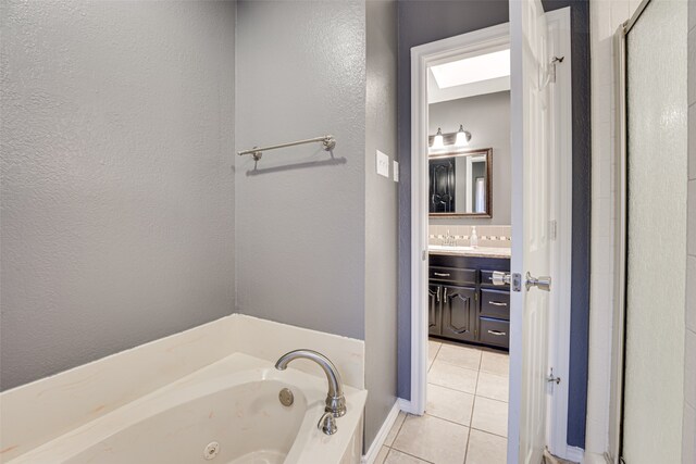 bathroom with tile patterned flooring, vanity, and plus walk in shower