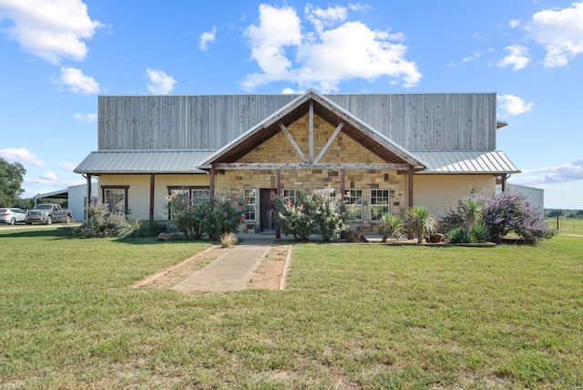 view of front of home with a front lawn