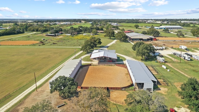 birds eye view of property featuring a rural view