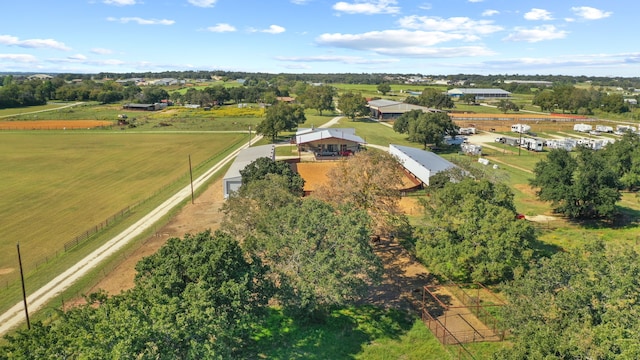 birds eye view of property featuring a rural view