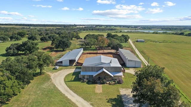 birds eye view of property featuring a rural view