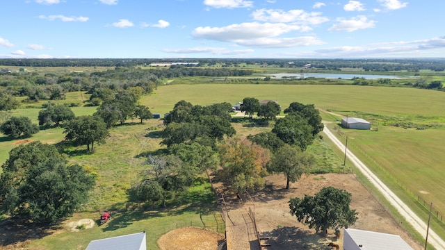 birds eye view of property with a water view and a rural view