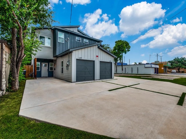 717-719 Sunset Ave, Dallas, TX 75208 - exterior space with board and batten siding and driveway