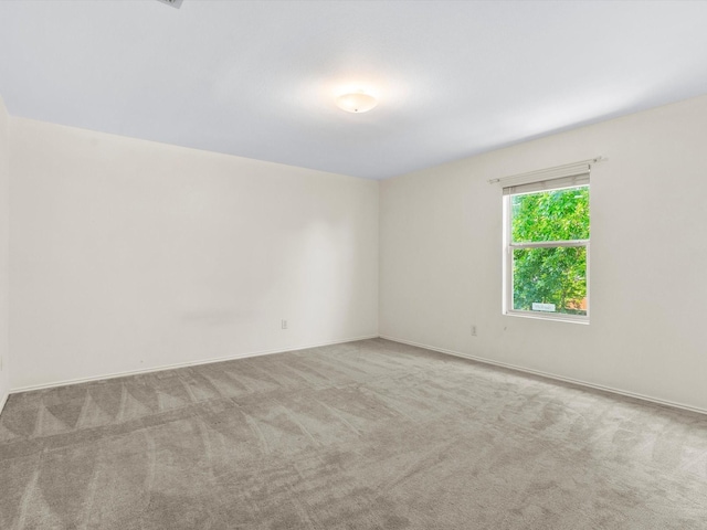 1517 Windward Ln, Wylie, TX 75098 - empty room featuring carpet and baseboards