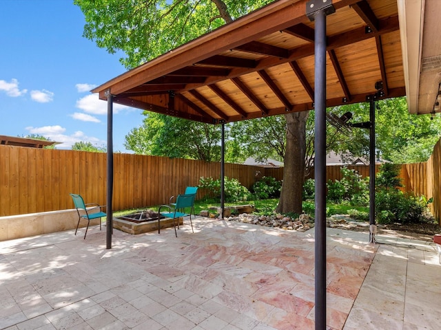 1517 Windward Ln, Wylie, TX 75098 - view of patio / terrace featuring an outdoor fire pit and a fenced backyard
