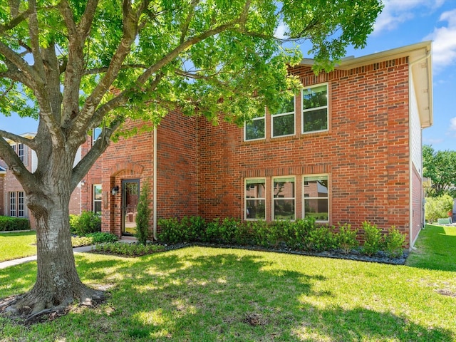 1517 Windward Ln, Wylie, TX 75098 - view of front of house featuring brick siding and a front lawn