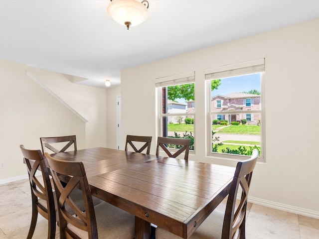 1517 Windward Ln, Wylie, TX 75098 - dining room featuring baseboards and light tile patterned flooring