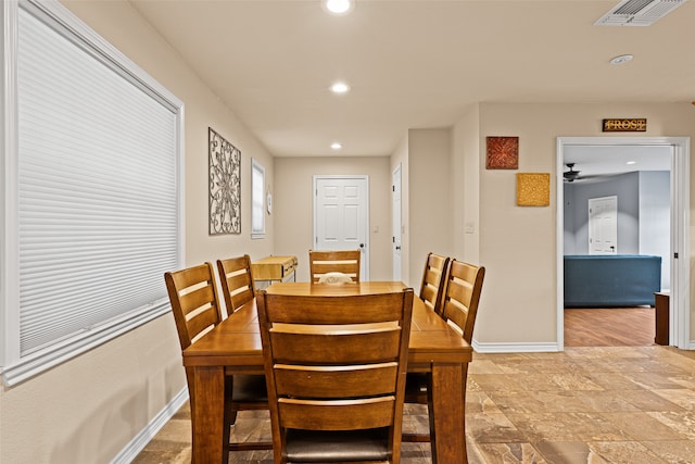 dining area with ceiling fan