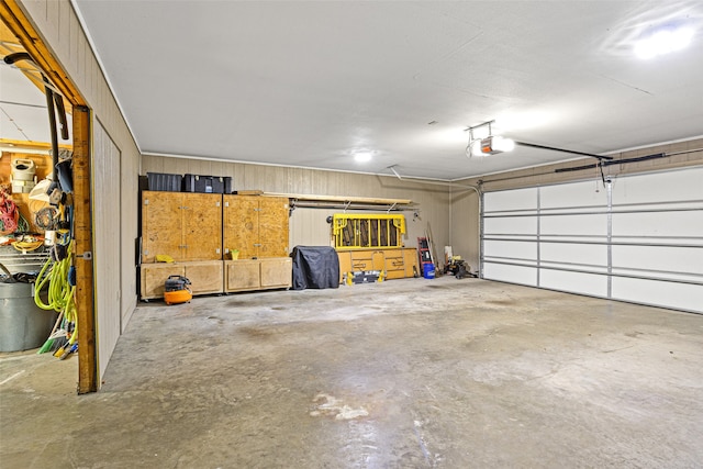 garage featuring a garage door opener