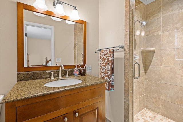 bathroom featuring vanity and walk in shower