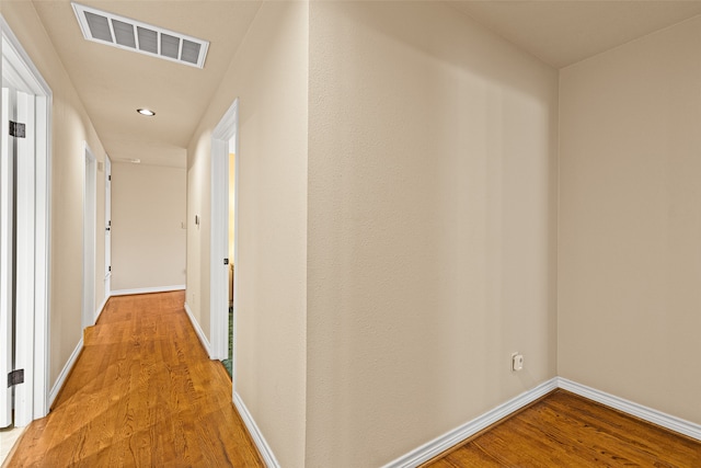 hallway featuring light wood-type flooring