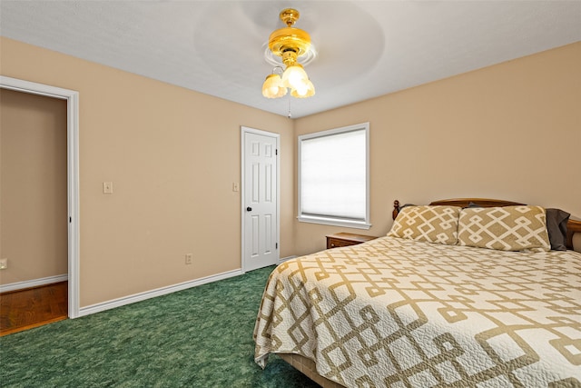 carpeted bedroom featuring a closet and ceiling fan