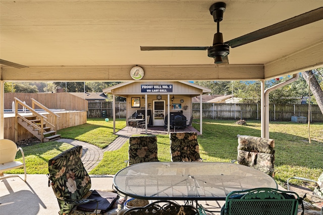 view of patio with ceiling fan