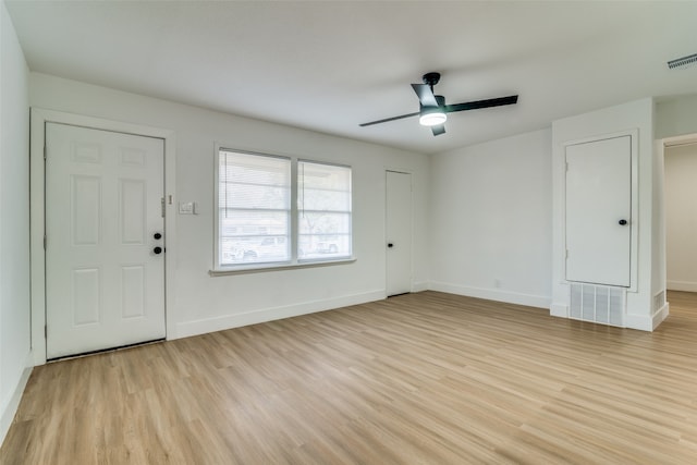 entrance foyer with ceiling fan and light hardwood / wood-style flooring