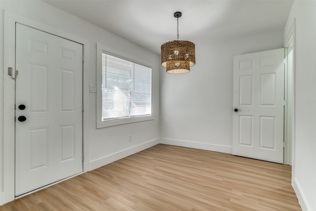 foyer with light hardwood / wood-style floors