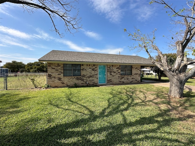 ranch-style home with a patio and a front lawn