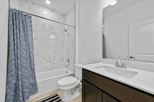 full bathroom with tile patterned flooring, vanity, toilet, and shower / bath combo