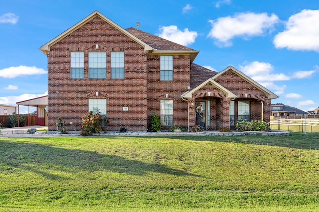 front facade featuring a front lawn