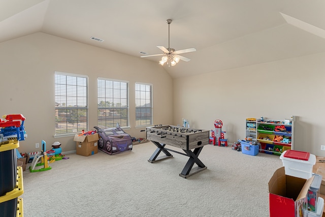 playroom featuring ceiling fan, carpet, and lofted ceiling