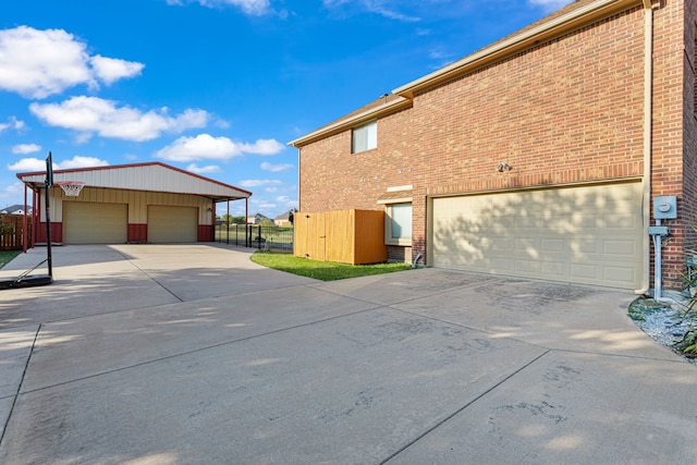 view of property exterior with a garage