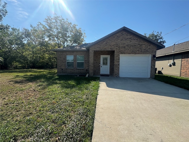 ranch-style home with a front lawn and a garage