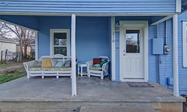 doorway to property featuring a porch