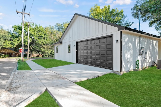 garage with a yard