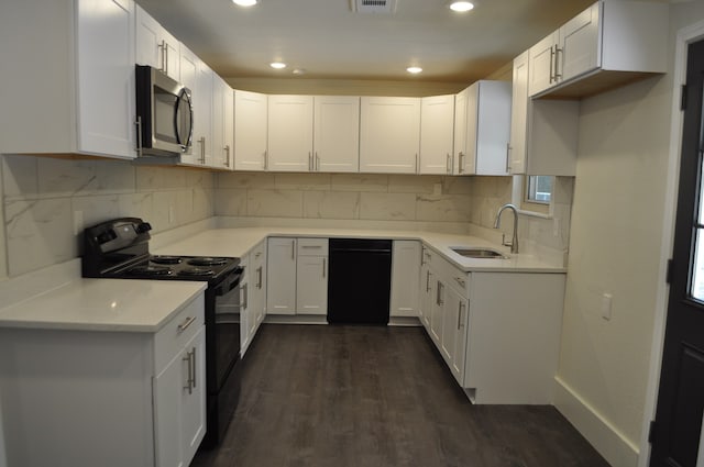 kitchen with black appliances, sink, dark hardwood / wood-style floors, and white cabinets