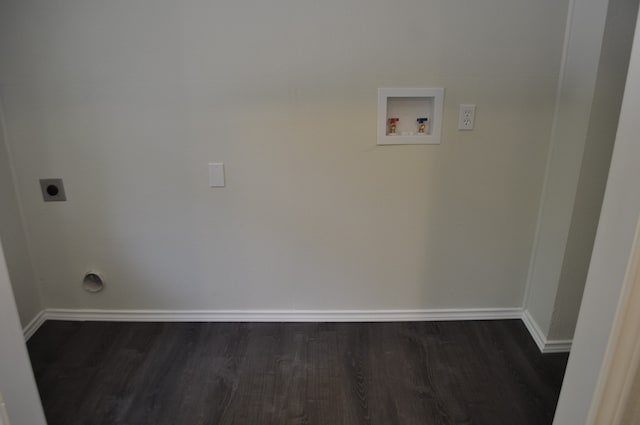 laundry area with dark wood-type flooring, electric dryer hookup, and washer hookup