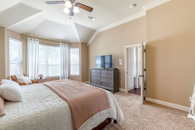 bedroom with crown molding, vaulted ceiling, light carpet, and ceiling fan