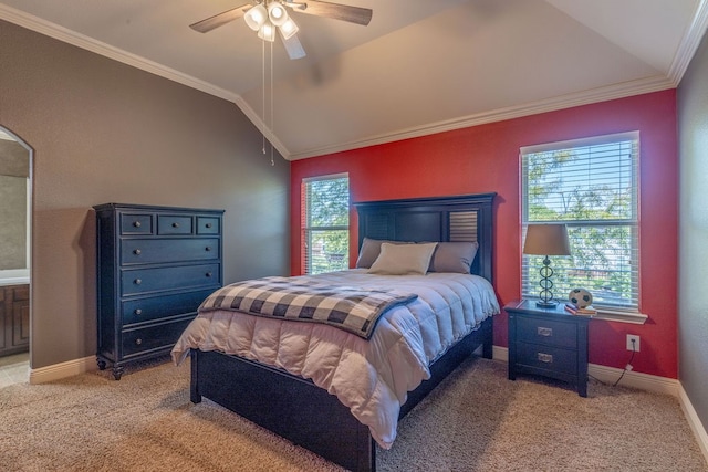 bedroom with multiple windows, ornamental molding, lofted ceiling, and ceiling fan