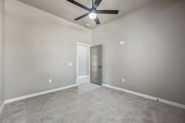 unfurnished room with ceiling fan