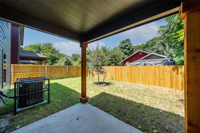 view of yard featuring a patio and central air condition unit