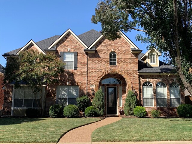 view of front property with a front lawn